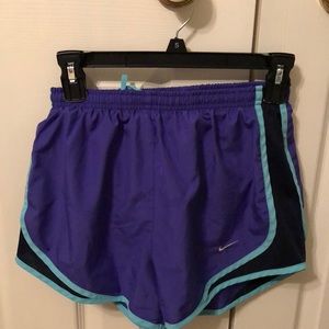 Purple Nike shorts